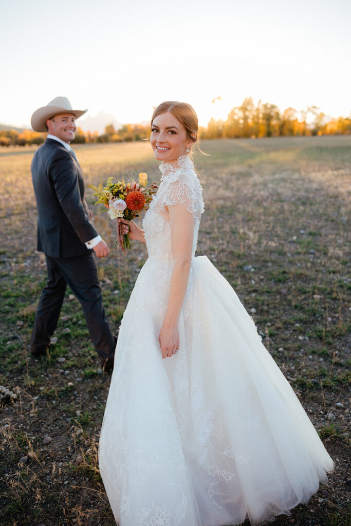 Jackson Hole WY bride and groom at ranch wedding - flowers by Dandelion Floral